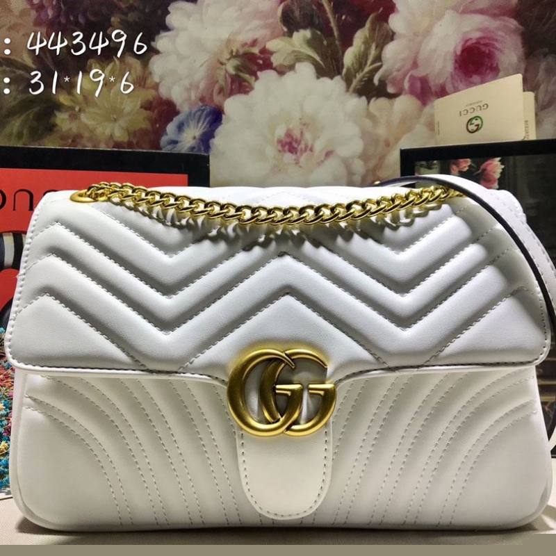 G*u*i satchel bags